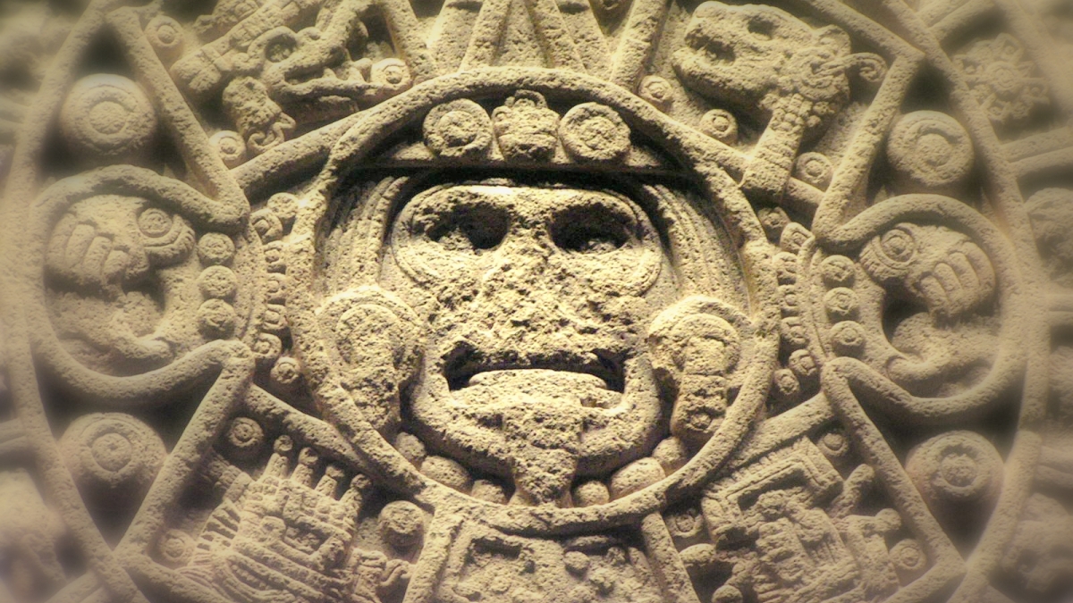 A detail from a stone Aztec calendar.