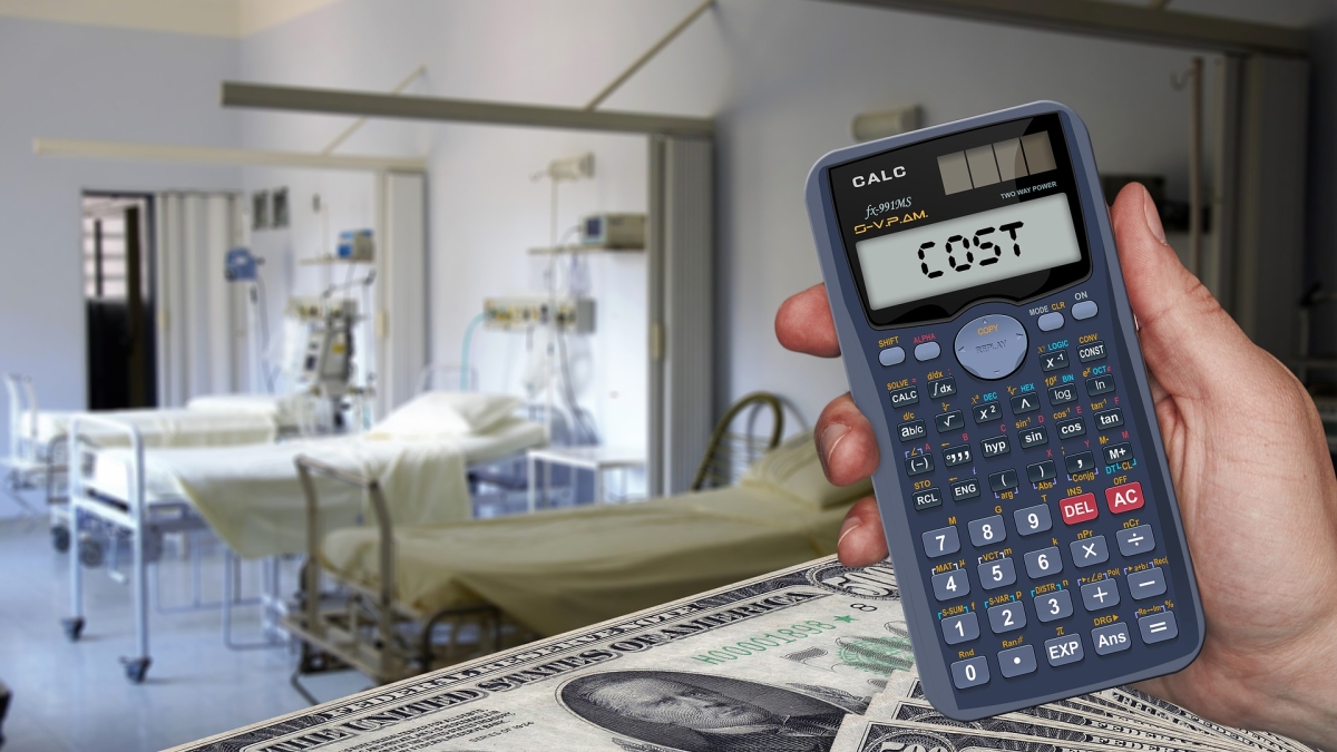 image of hospital with money in foreground