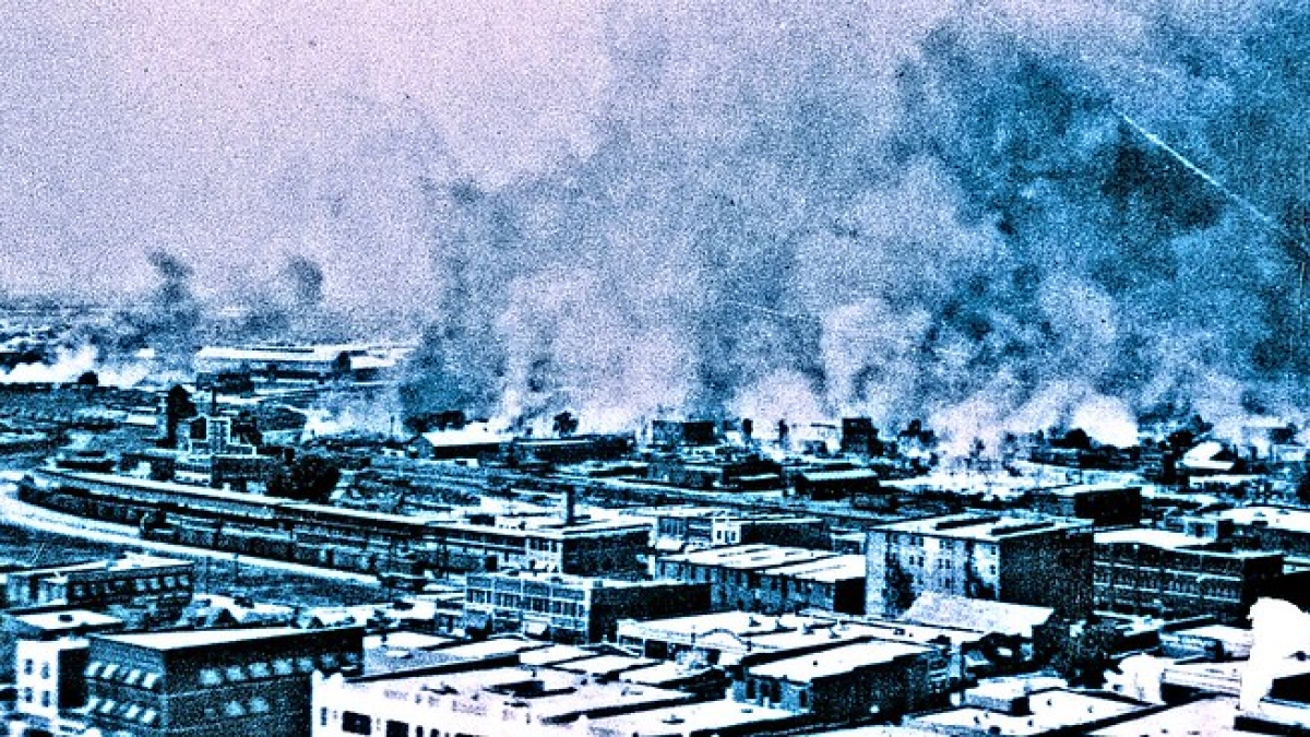 historical photo of town on fire