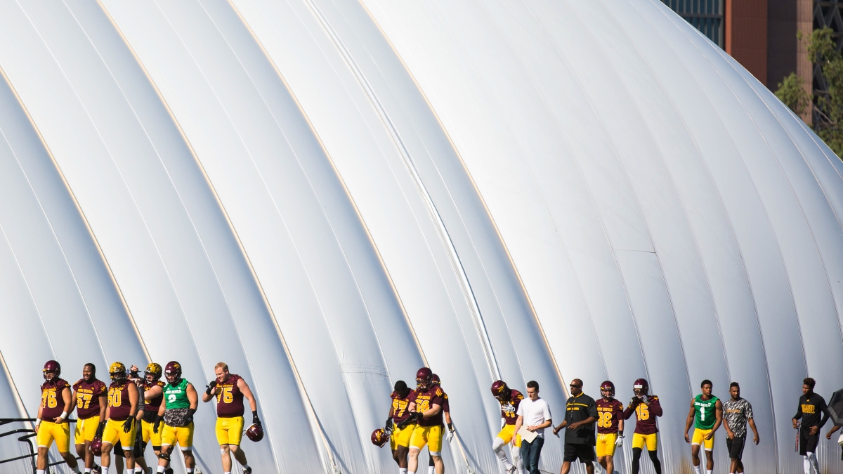 Football players walking