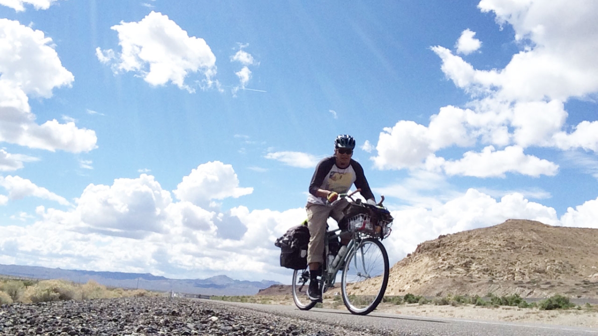 ASU master&#039;s student Kenny Dyer-Redner rides a bike through Nevada Indian reservations.