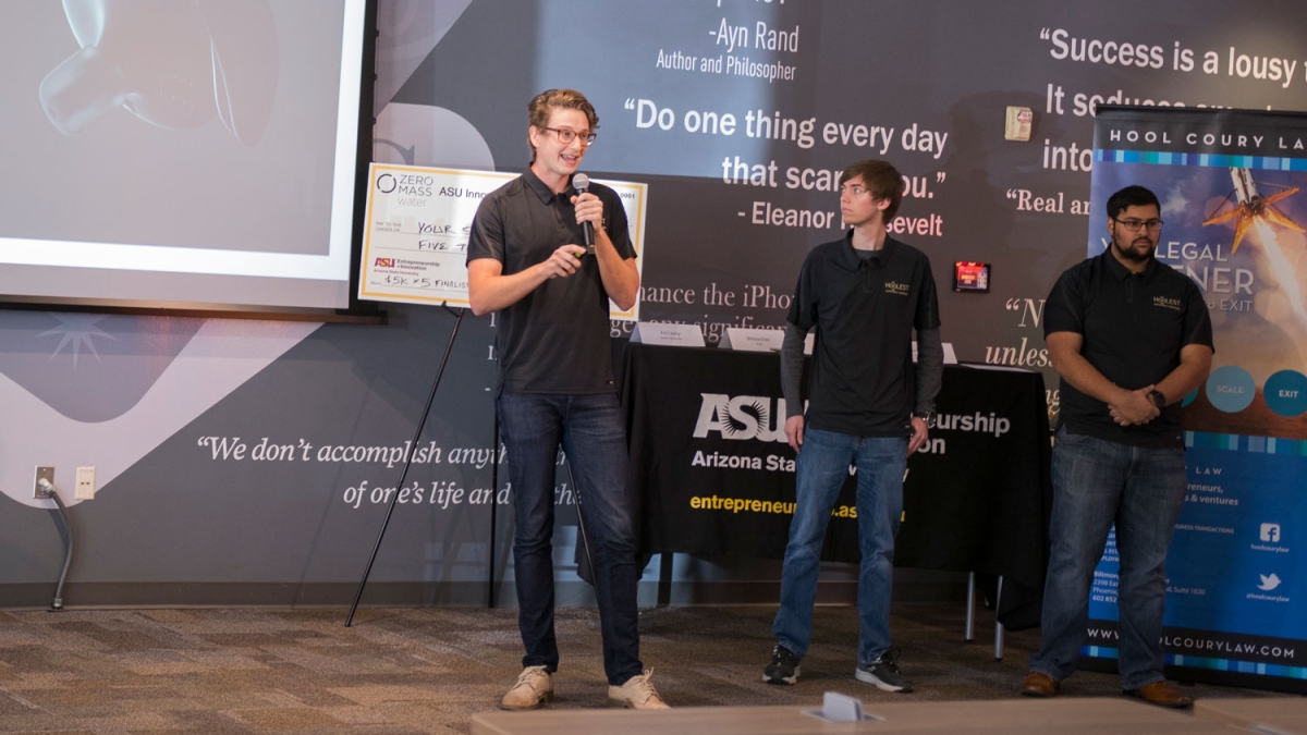 Nicholas Hool, John Patterson and Sami Mian pitch the Hoolest earbud at the ASU Innovation Open semifinal round.