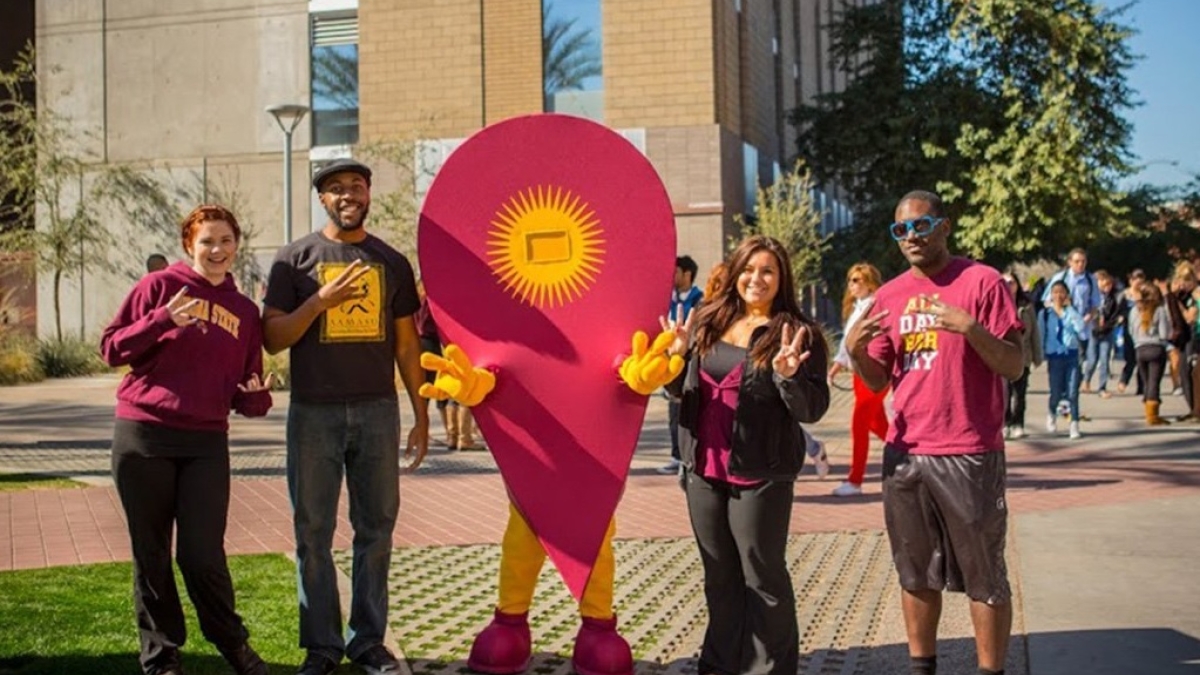 ASU students pose with Markie the Sunspot