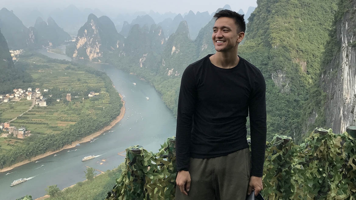 ASU grad Thomas Quiroz in the hills of Guilin, China, during study abroad