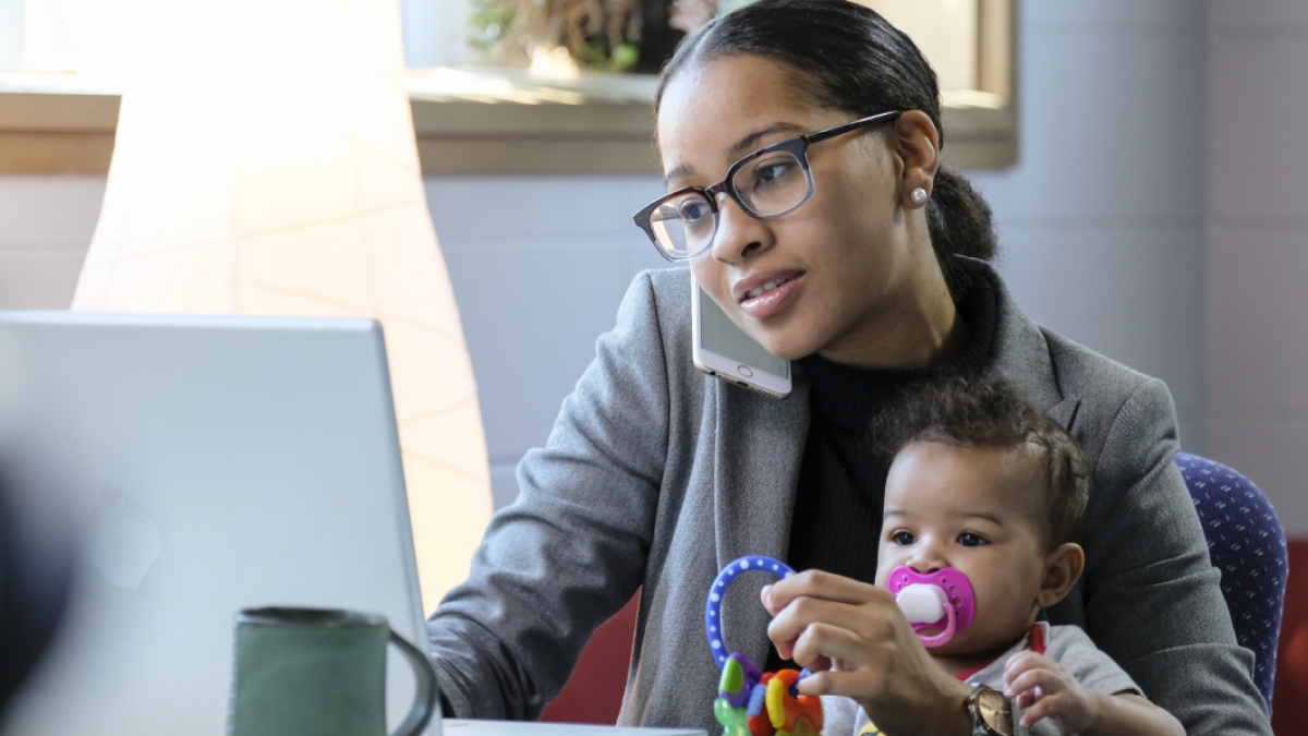Graduate student works while caring for baby