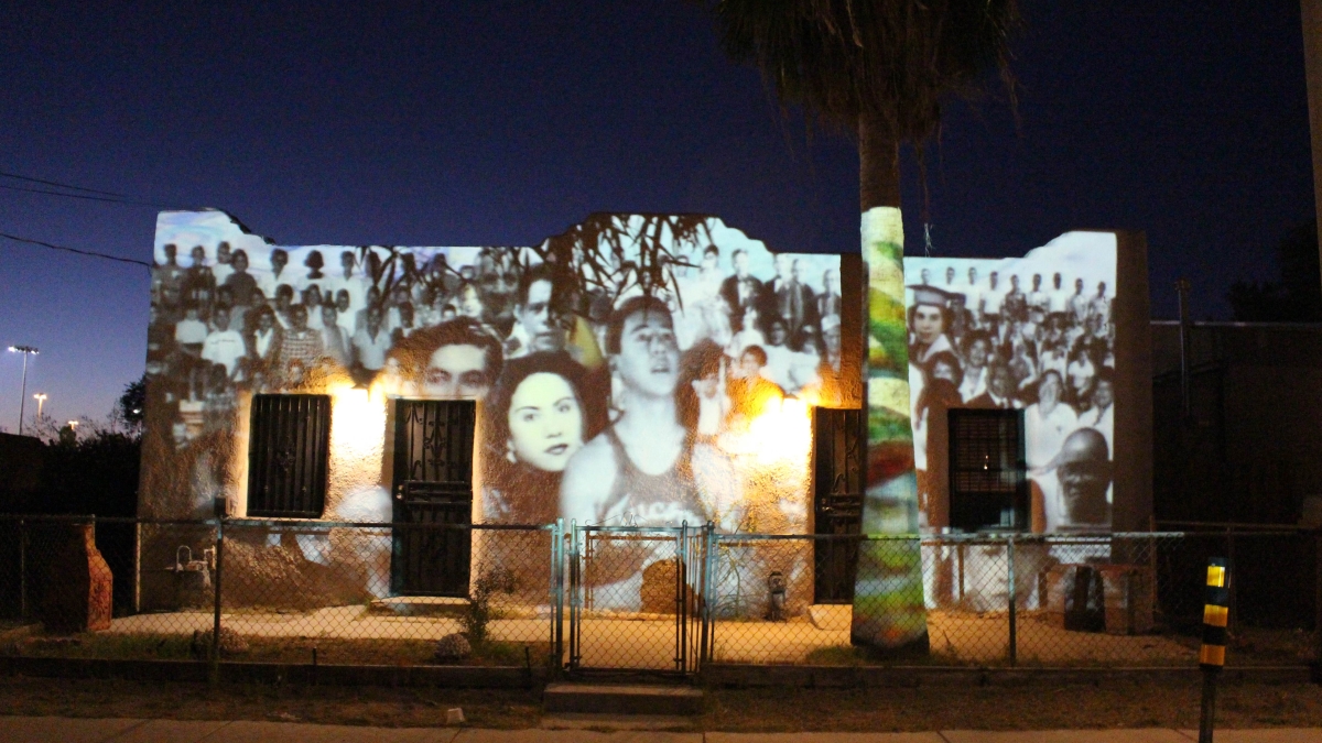 Photo projections on a historic building in Barrio Anita.