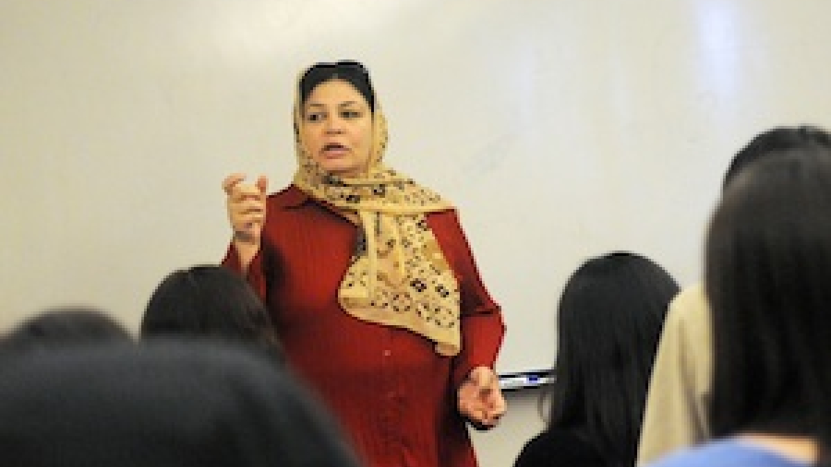 A picture of Marzia Basel speaking to a class on women and global conflict