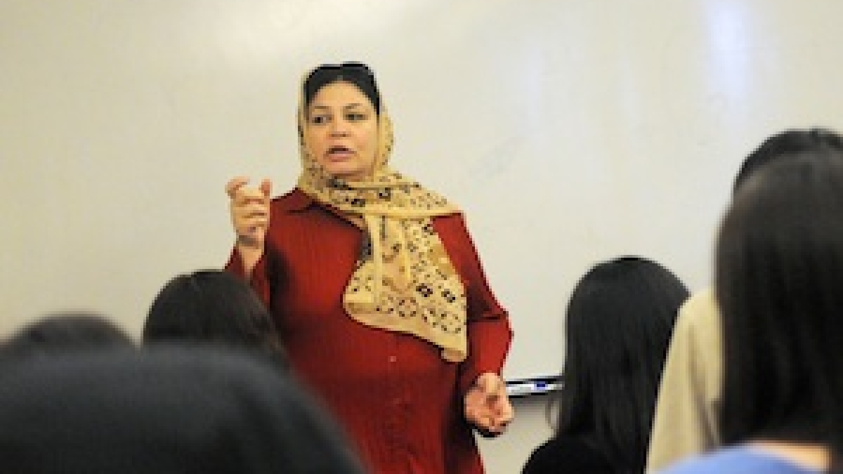 A picture of Marzia Basel speaking to a class on women and global conflict