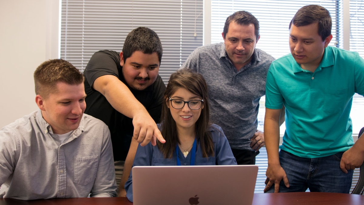 McKesson Vice President of Cybersecurity Operations and Services Paul Black (second from right) hired on the first class of interns from Arizona State University's Ira A. Fulton Schools of Engineering and W. P. Carey School of Business in summer 2017. 