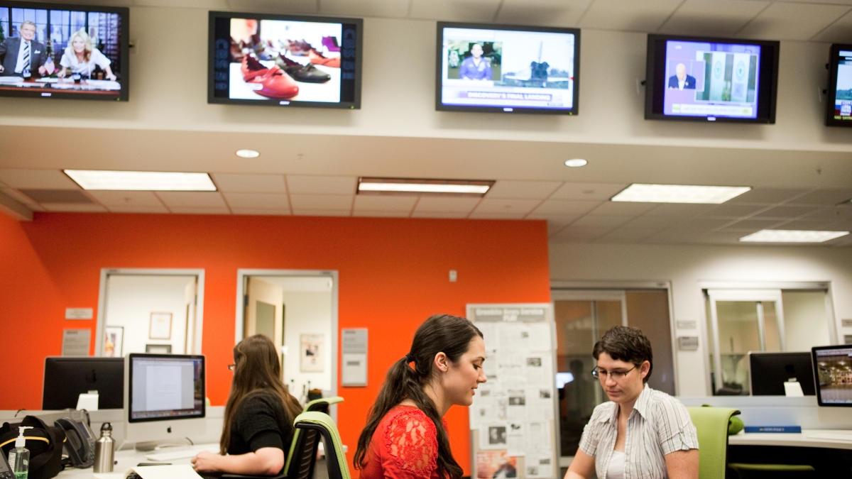 students working in a newsroom at the ASU Cronkite School