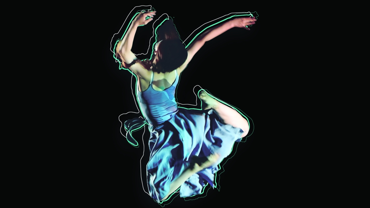 dancer in blue dress leaps into the air