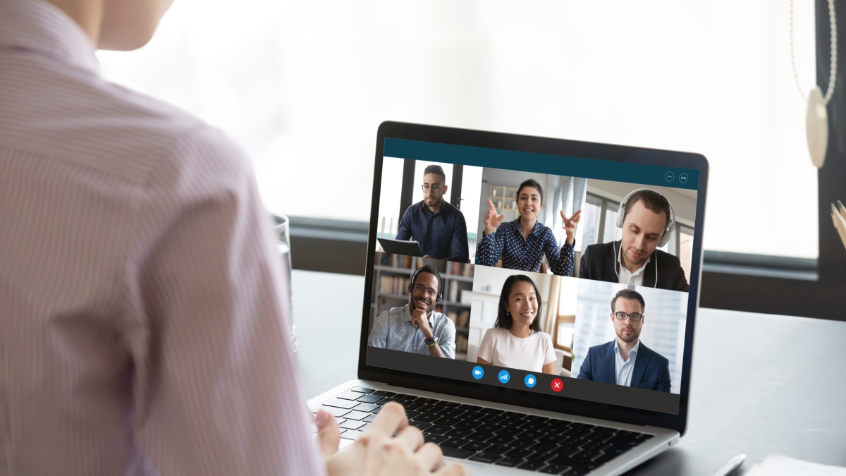 Person particiaptes in video conferencing 
