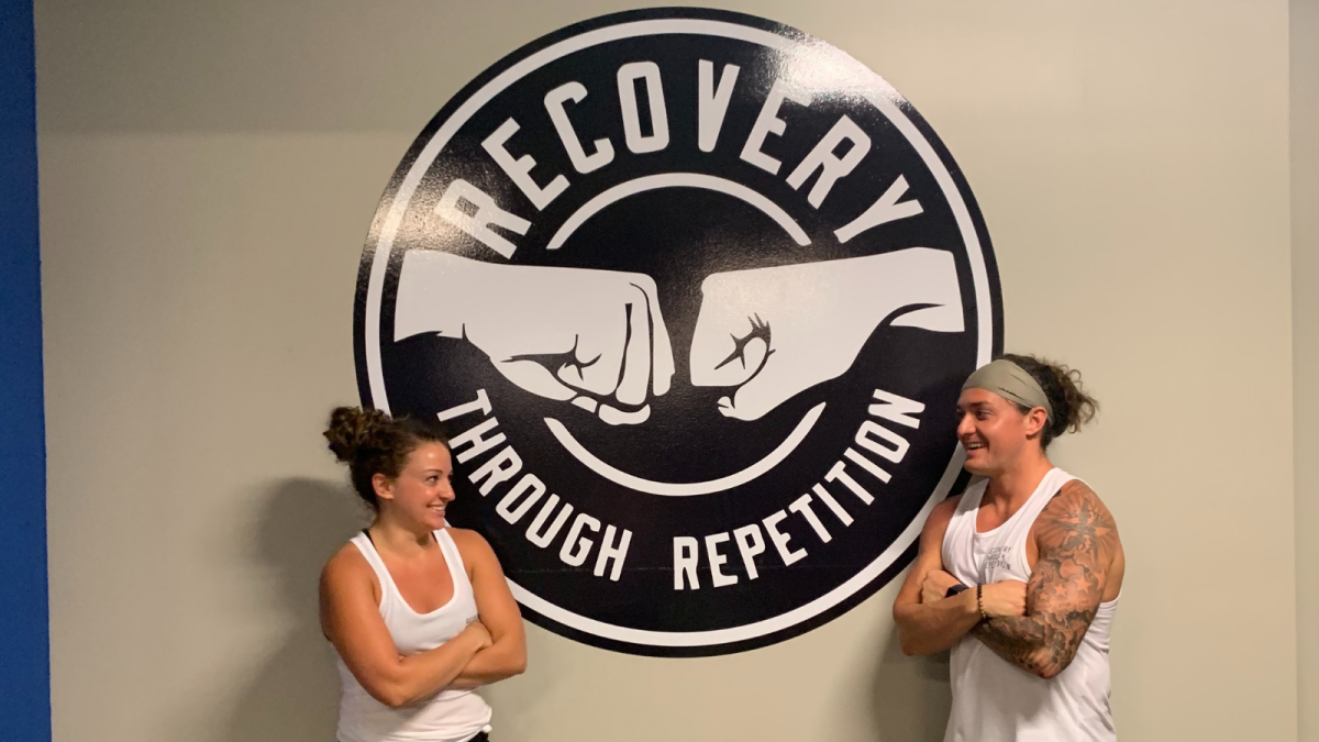 Hayley Avino and brother Jeremy Plummer inside Plummer's Florida-based group fitness center.