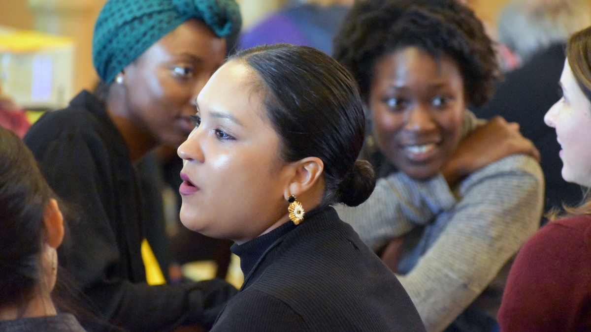 Participants engaged in conversation at RaceB4Race in January 2019