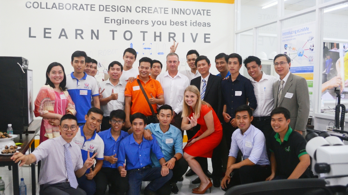 Photo of large group of people posing at the launch of the Maker Innovation Space in Ho Chi Minh City, Vietnam