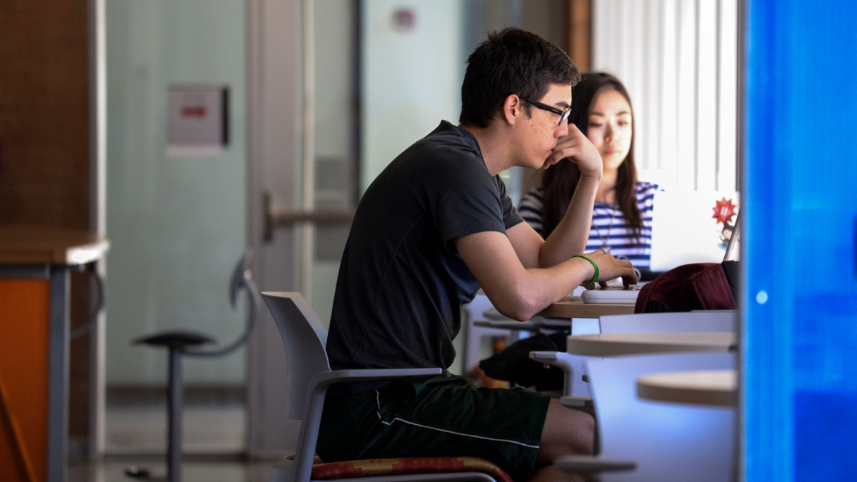 Students study intently at the ECG Student Center on the Arizona State University Tempe campus.