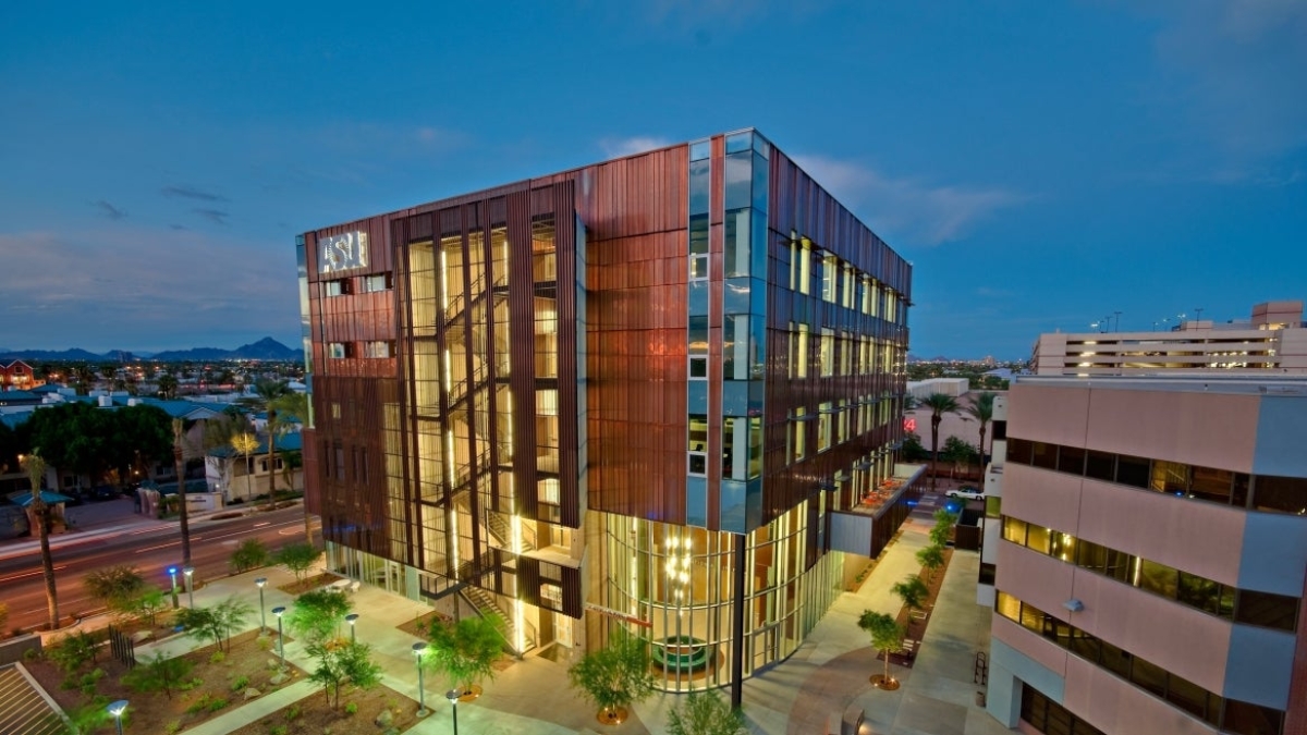 An image of Edson College of Nursing and Health Innovation's main building on the ASU Downtown campus at night