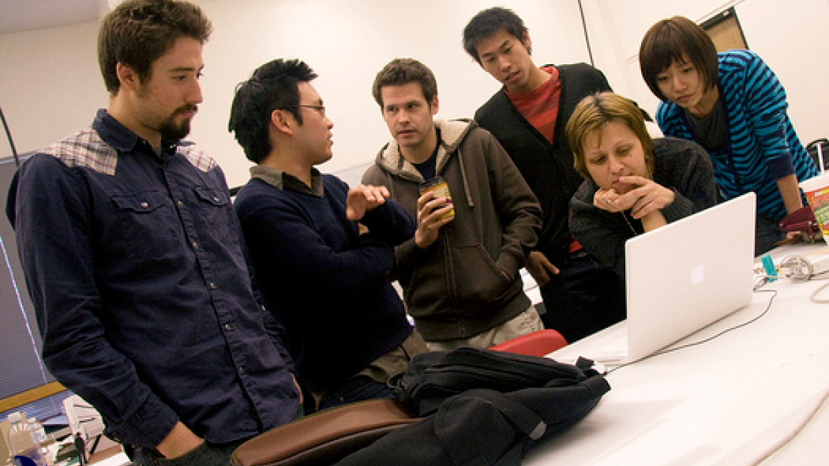 students looking at a computer