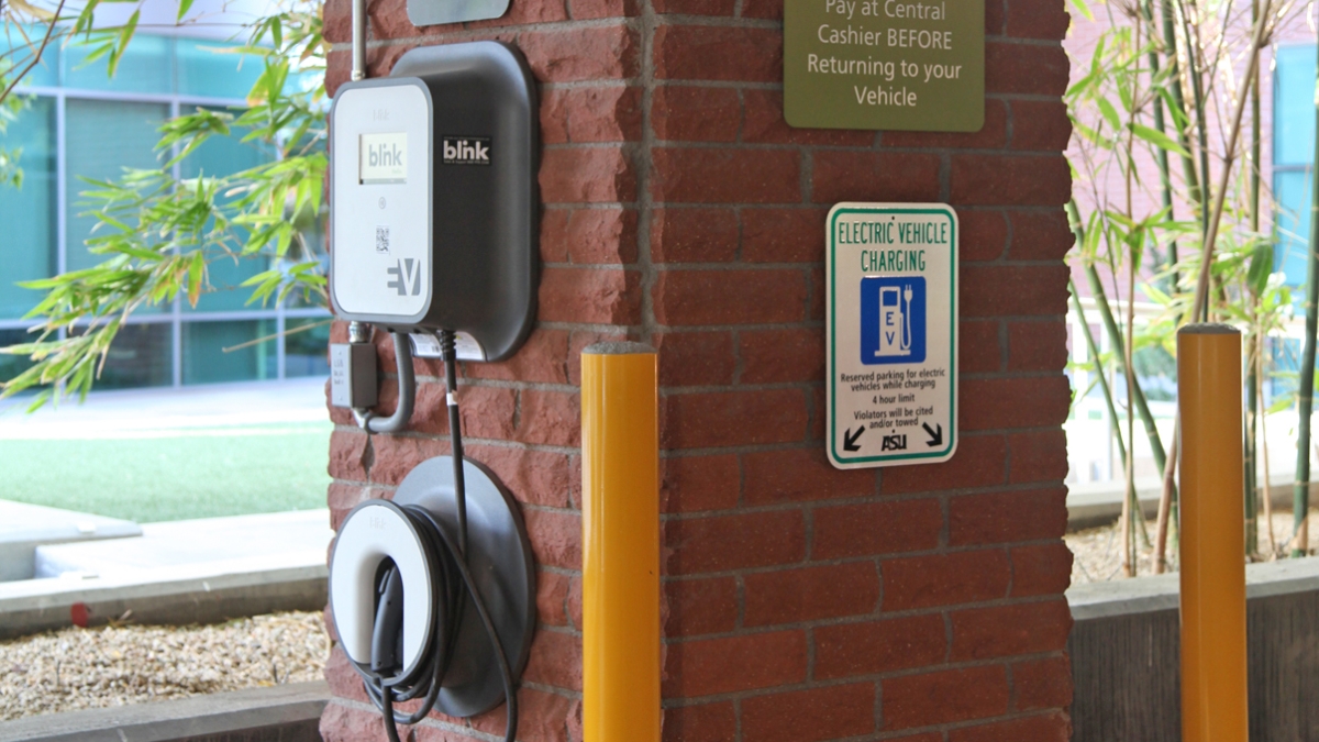 An EV charging station is mounted to a pillar at the Fulton Center garage.