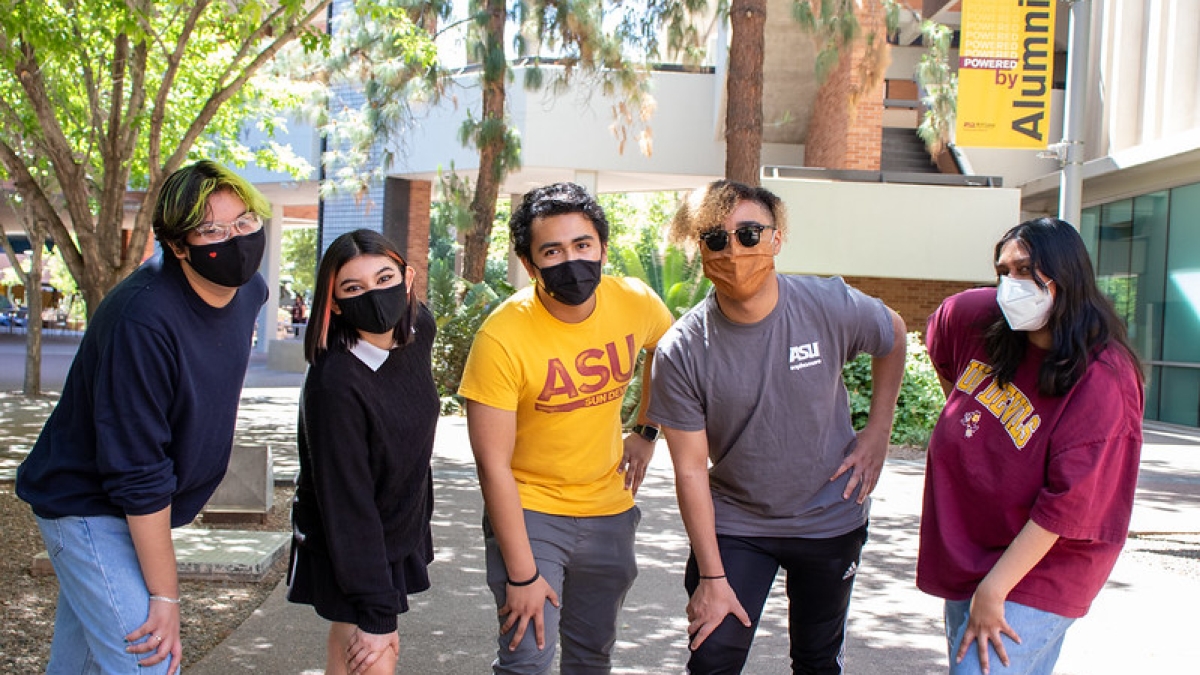 A group of five students in masks on ASU's Tempe campus