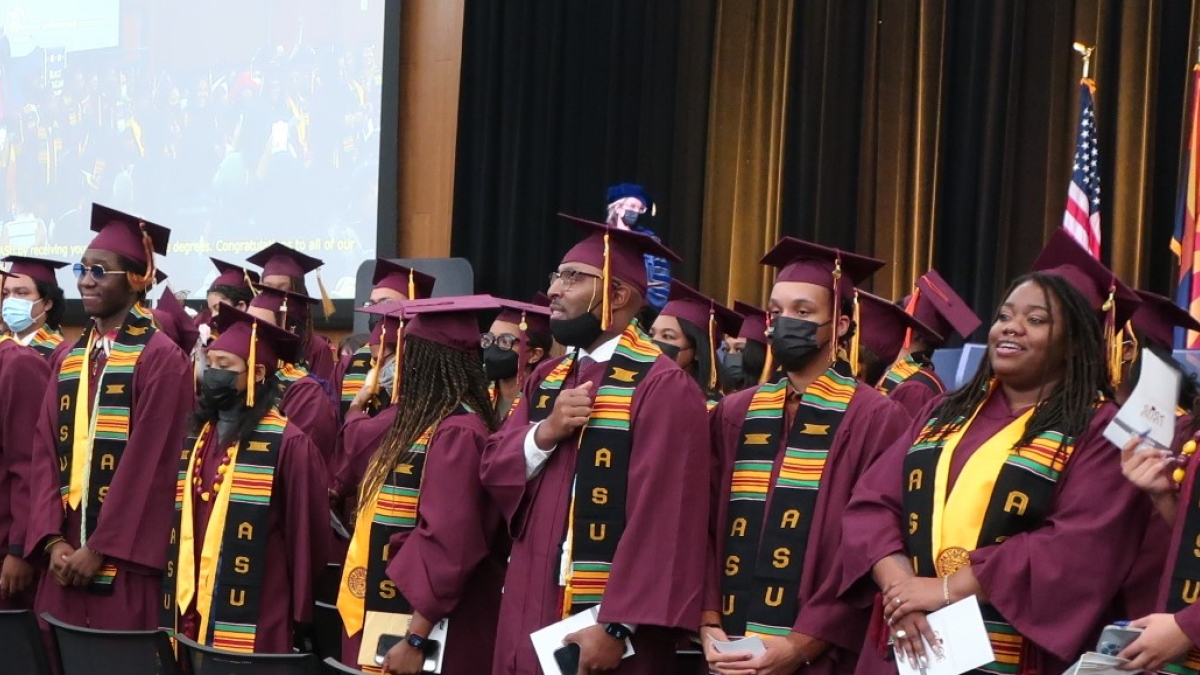 Graduates in caps and gowns at ASU's Black African convocation.