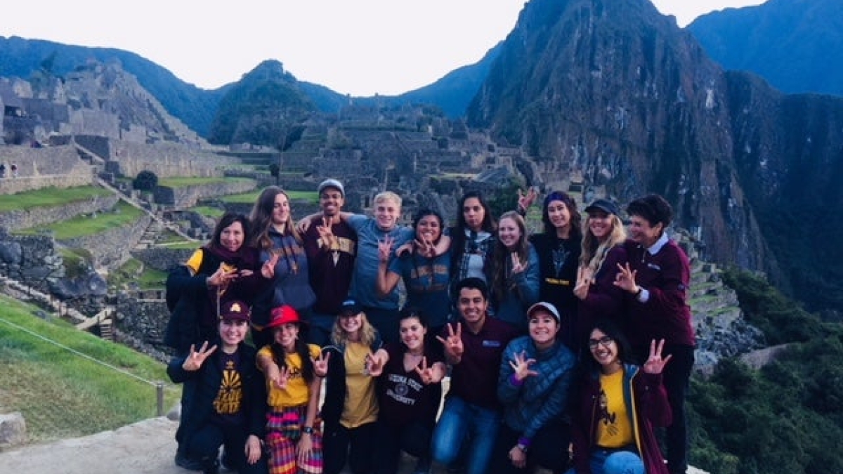 A group of ASU students pose in front of Machu Picchu during a study abroad trip to Peru