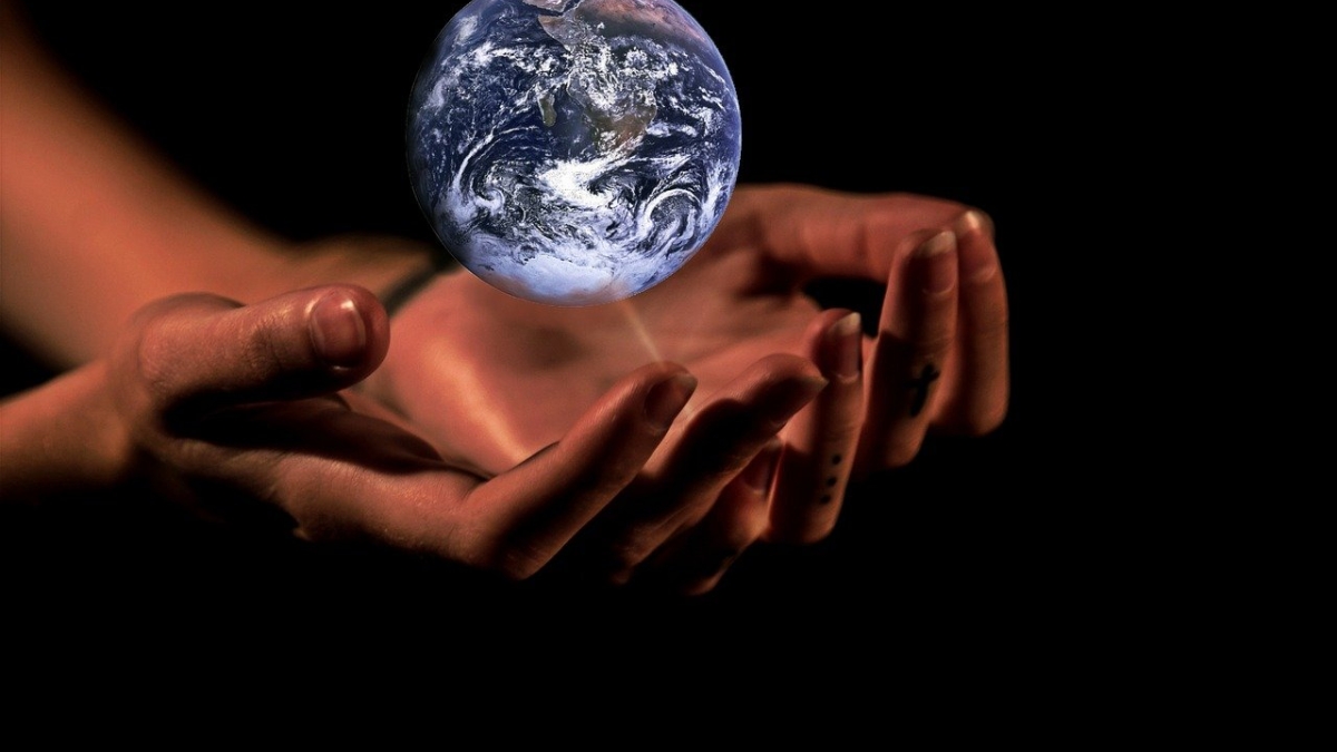 hands cradling globe illustration