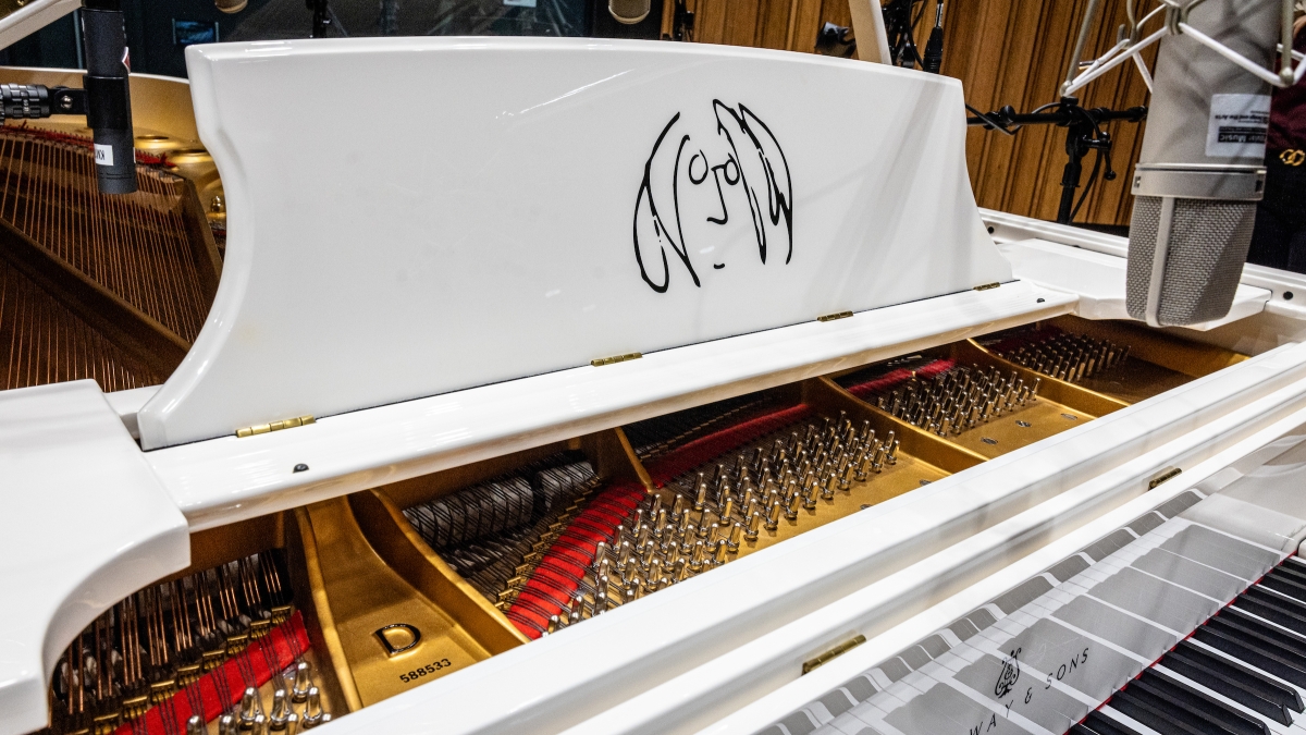 Close-up of a limited-edition "Imagine" grand piano featuring a doodle by John Lennon.