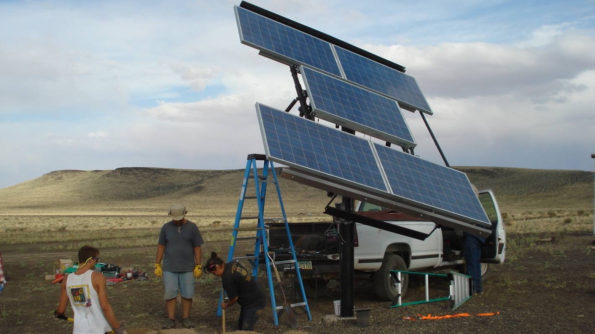 people installing solar panel