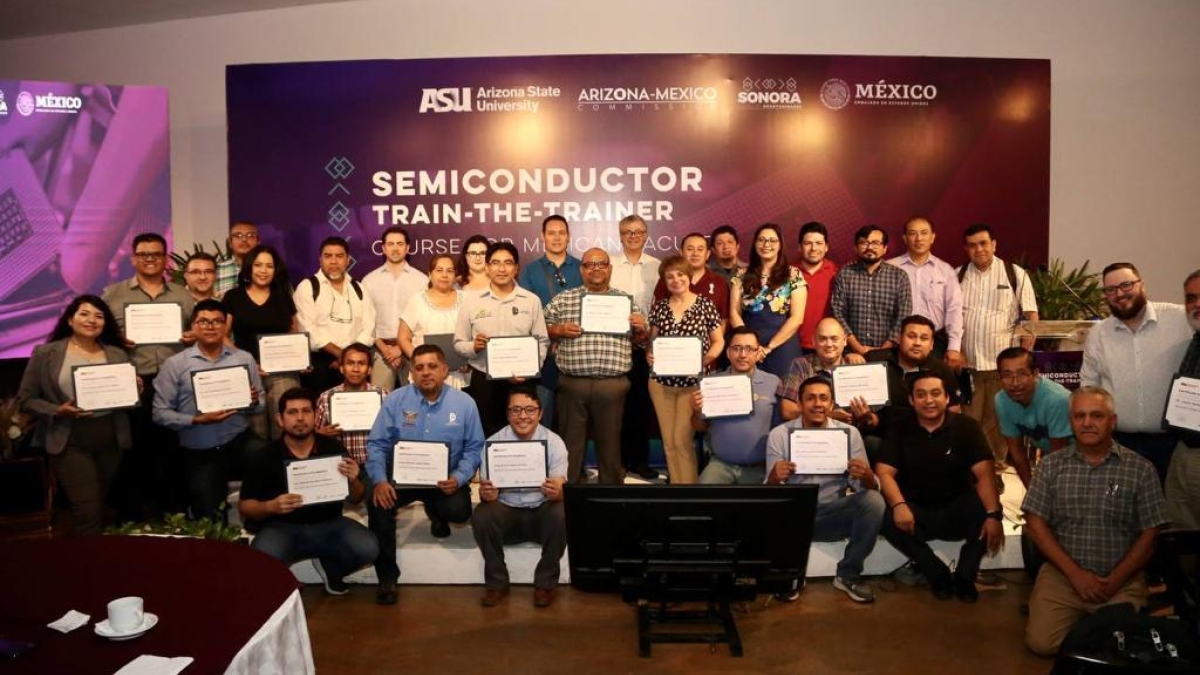 ASU train-the-trainer semiconductor course graduates posing for a group photo.