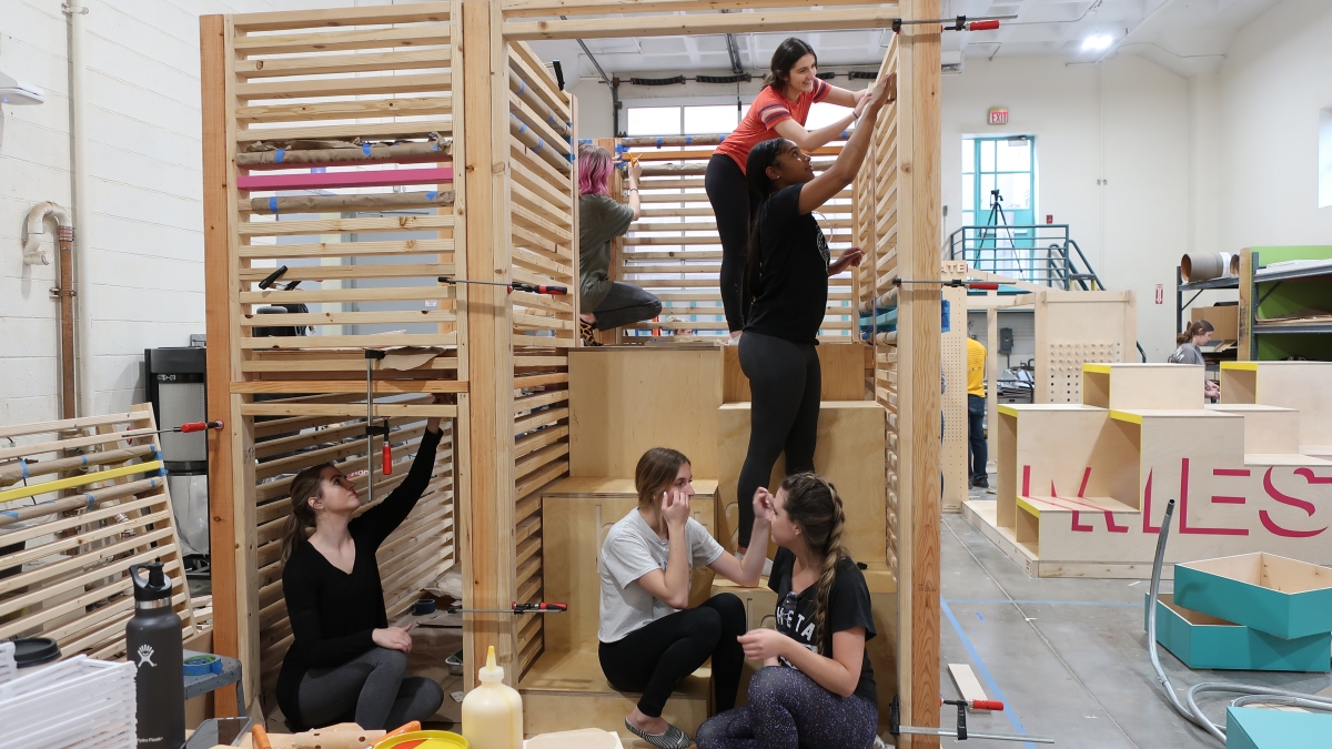 Students work on the Inter Play installation at The Design School at ASU. 