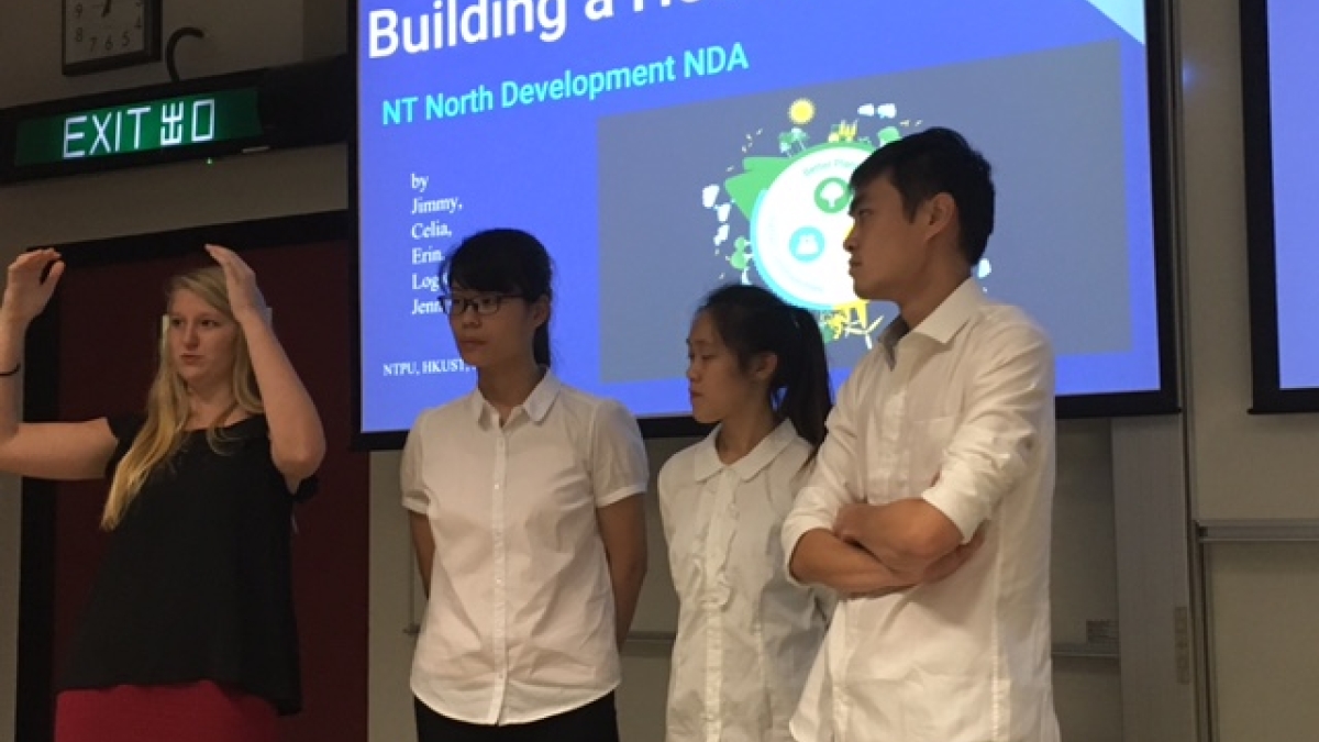 Four students give presentation