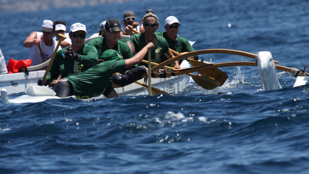 A six person outrigger canoe with ASU crew members