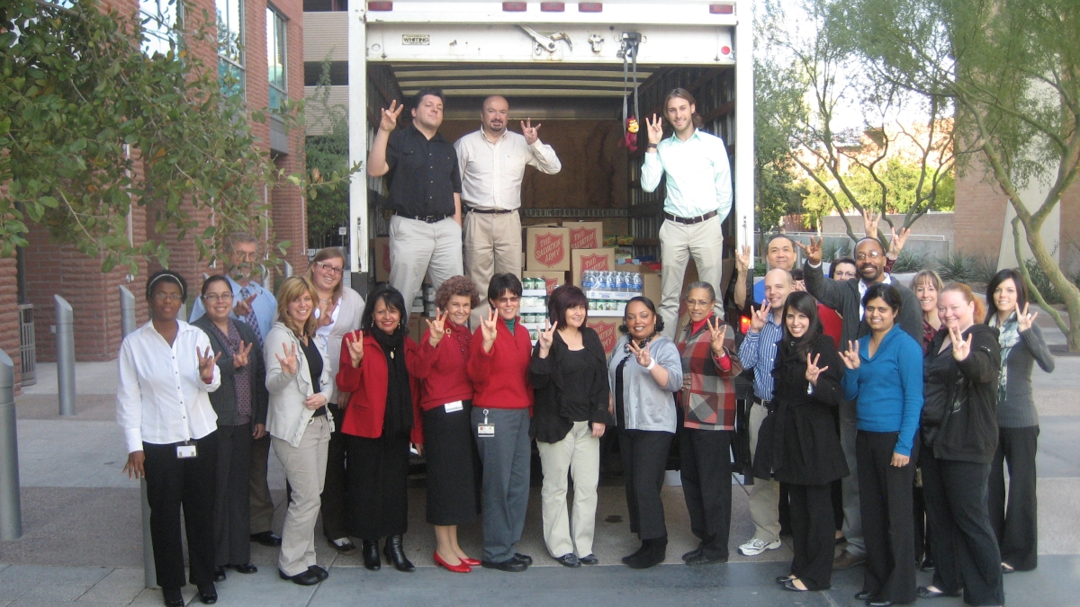 ASU Foundation employees with their holiday food donation to the Salvation Army.