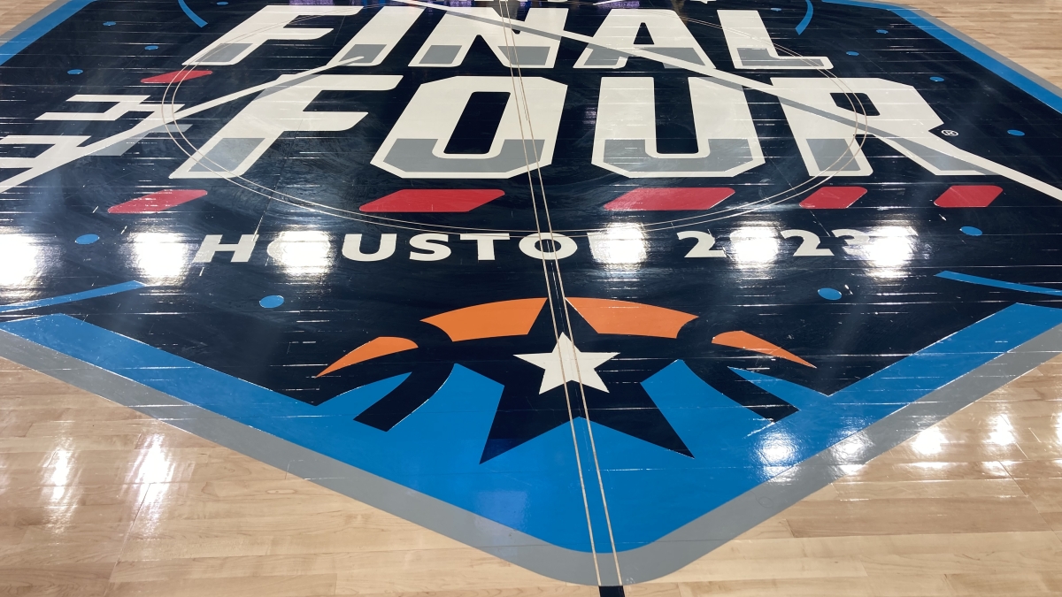 Floor of basketball court with Final Four 2023 logo on it