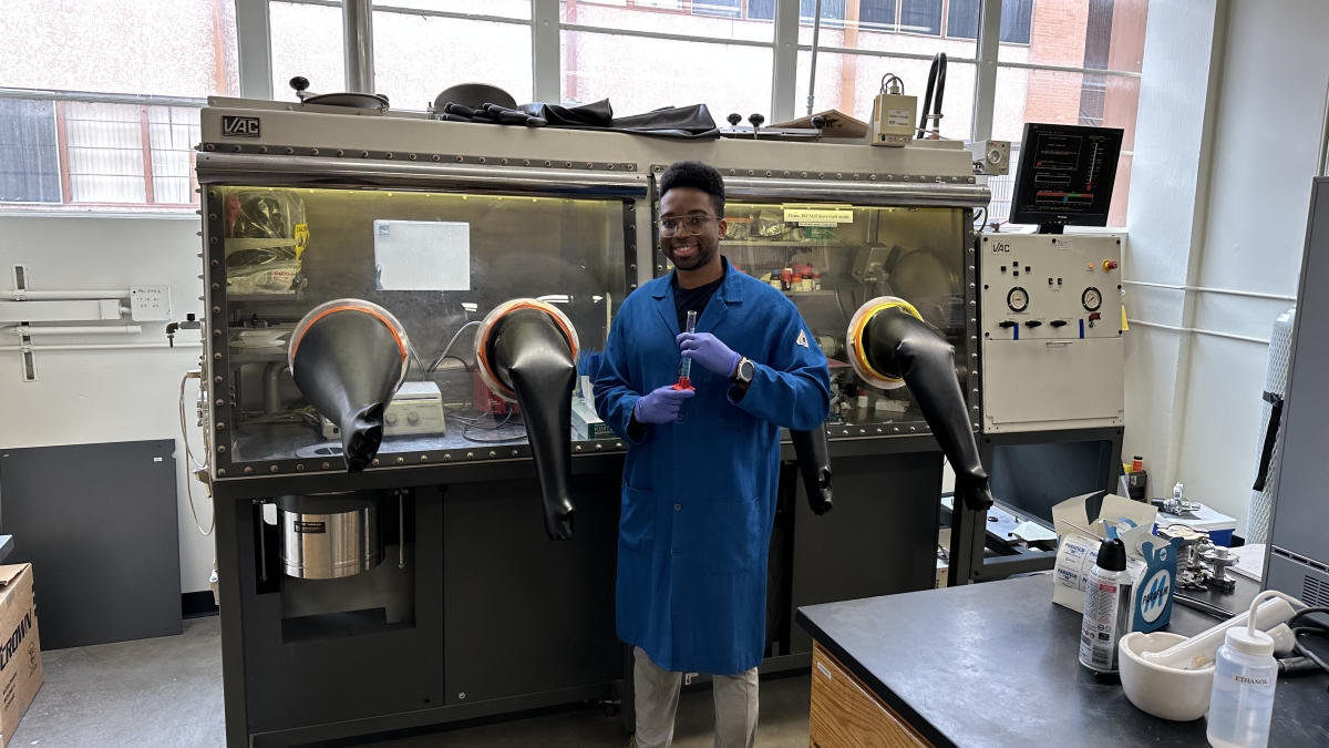 Gerson standing in a lab, posing for the photo.