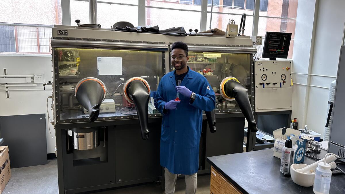 Gerson standing in a lab, posing for the photo.