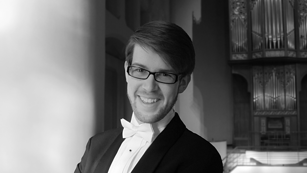 black and white portrait of ASU grad Jonathan Gregoire in a tuxedo