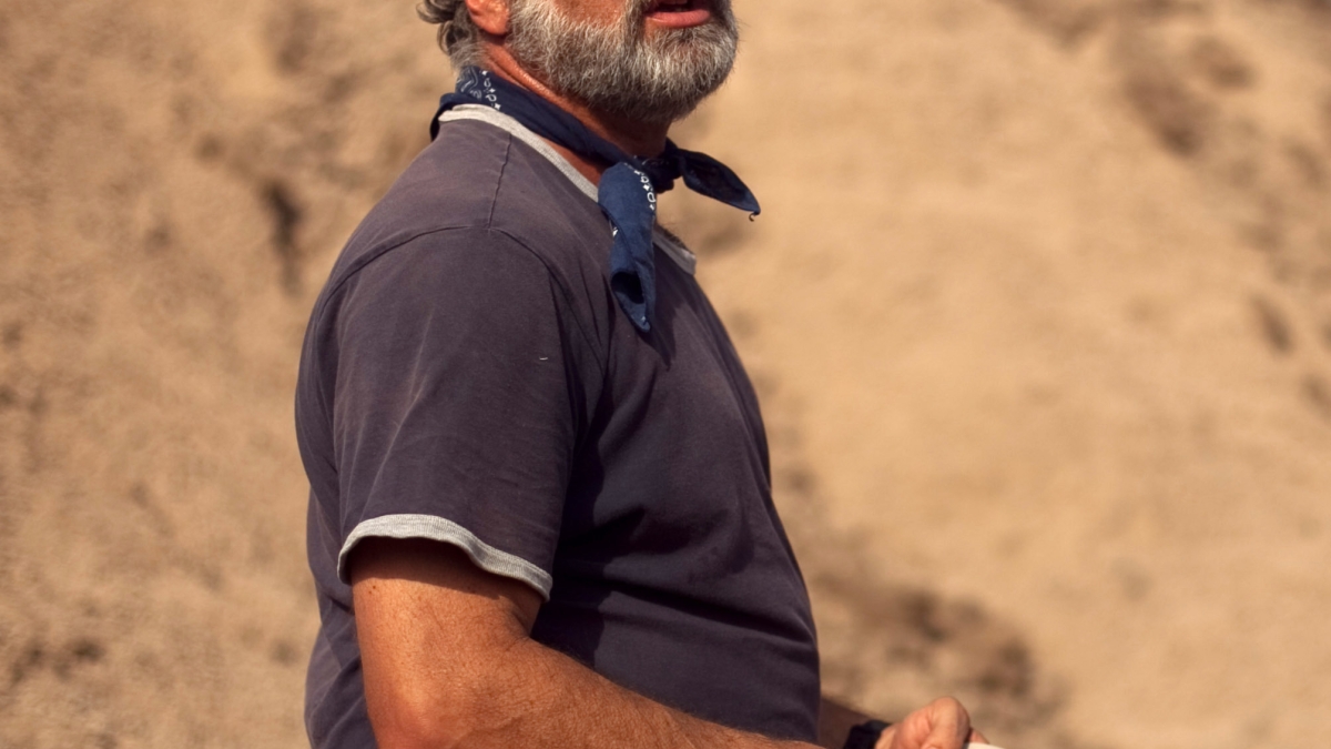 The late ASU Professor Bill Kimbel outdoors in a desert setting.