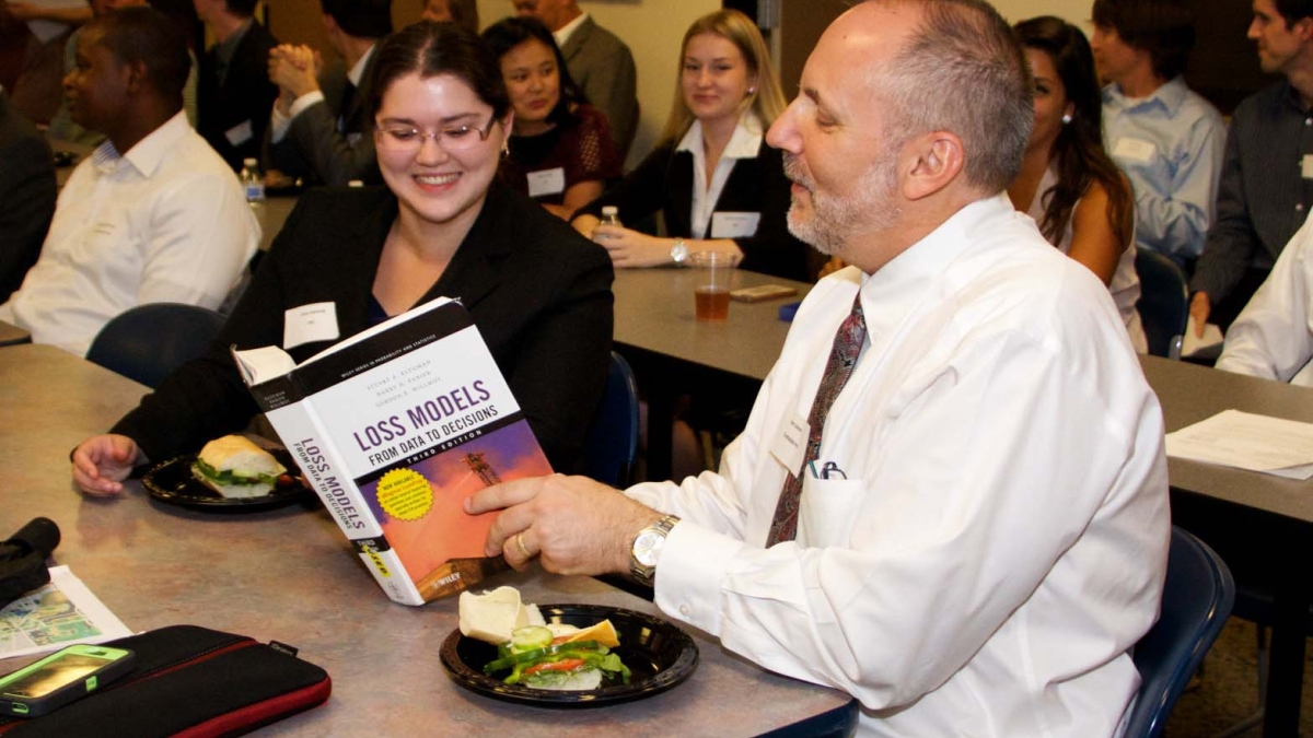 Ken Levine with actuarial science major, Grace Kennedy