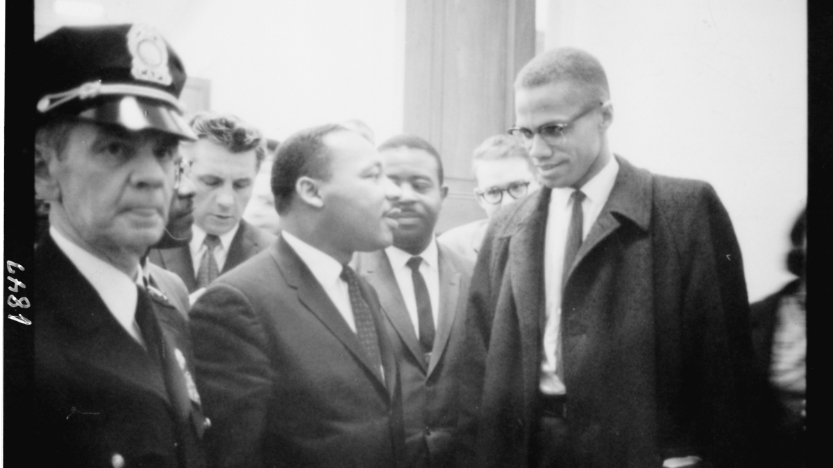 Martin Luther King and Malcolm X waiting for press conference, 1964. Photo by Marion S. Trikosko. Image from Library of Congress; no known restrictions on usage.