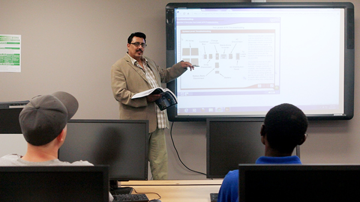 Quijada teaching solar energy technology class