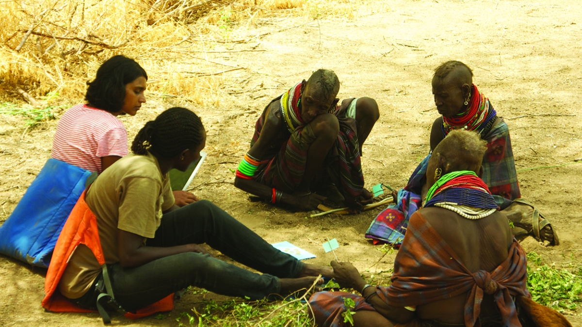 Sarah Mathew in the field with Turkana people