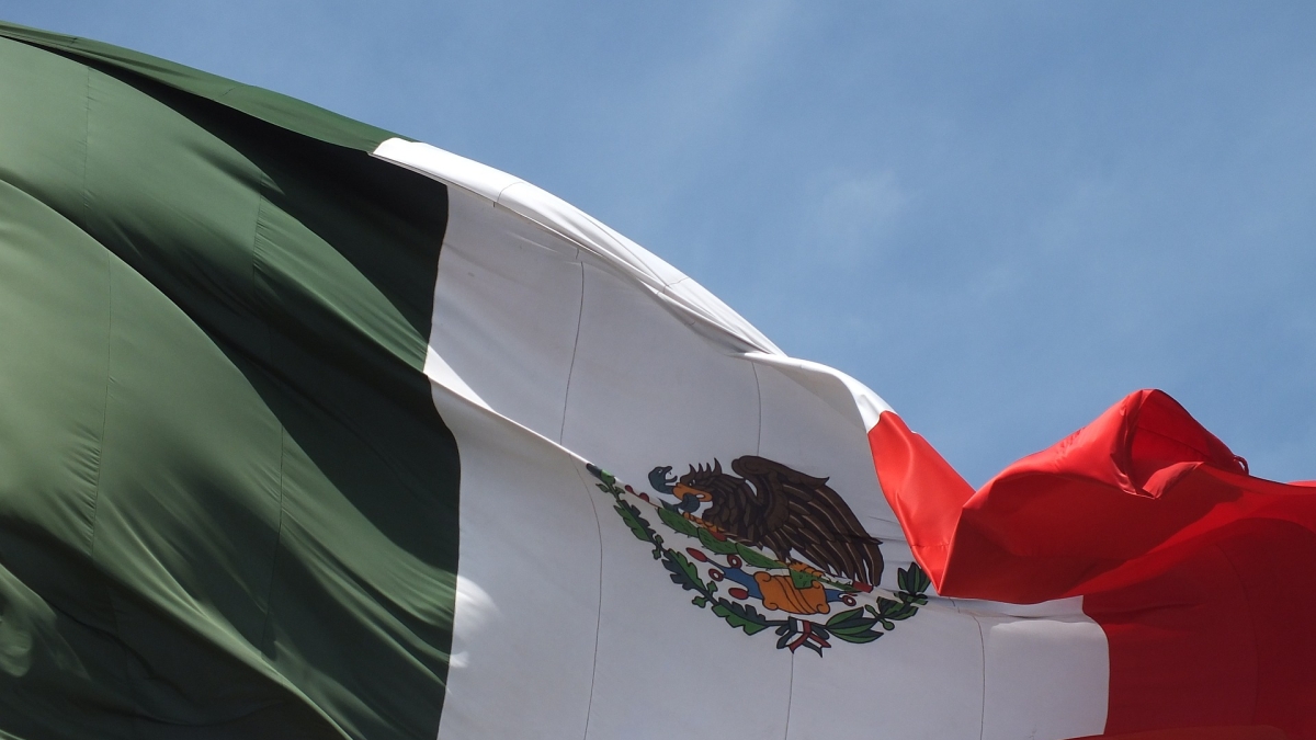 Mexican flag blowing in the wind.