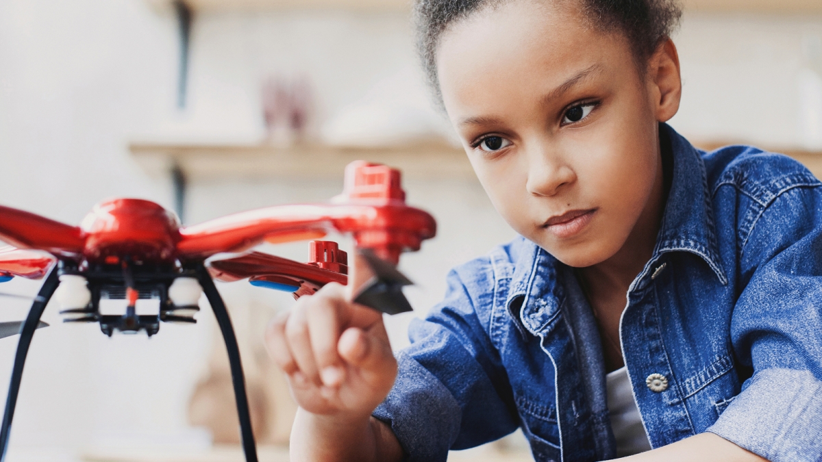 Girl working on robot