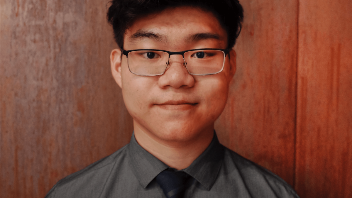Headshot of the featured graduate, Michael Wang