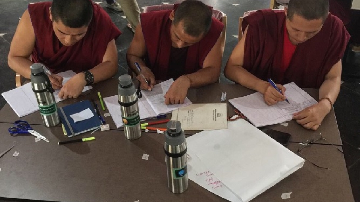 Buddhist monks writing