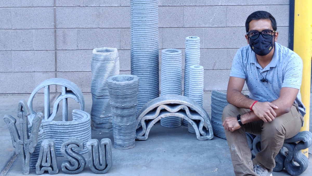 Examples of 3D concrete printing shown with Sooraj Nair, an ASU doctoral student in Narayanan Neithalath's lab group