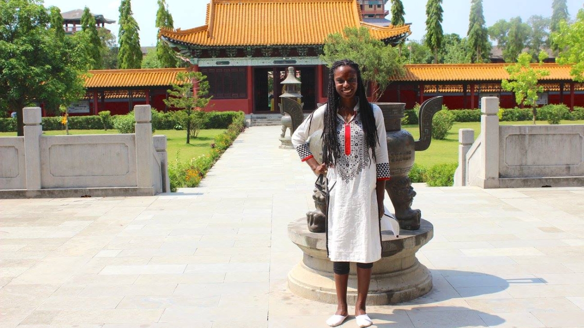 ASU PhD student Leah Jones stands outside Nepali temple