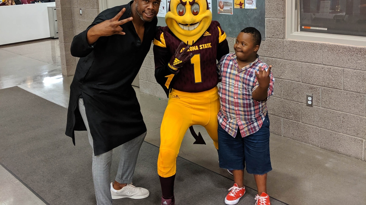  Nakia Gorden and his son show their Sun Devil pride and pitchforks with Sparky